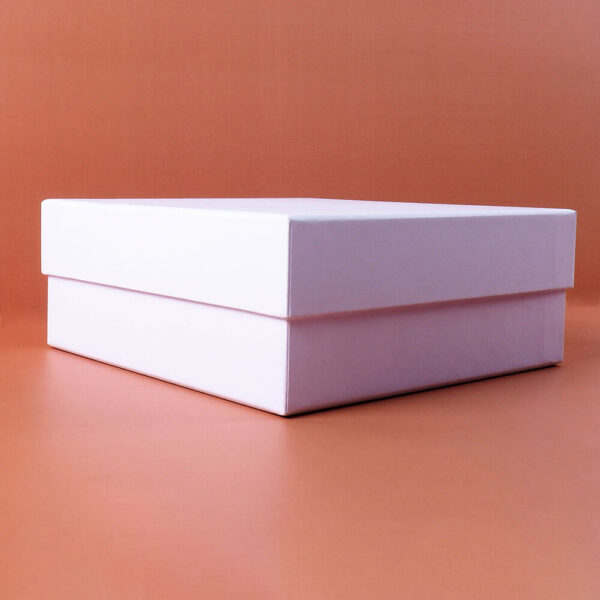 white cardboard box cover